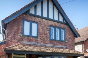 Grey coloured uPVC windows in Flush Sash Casement window style