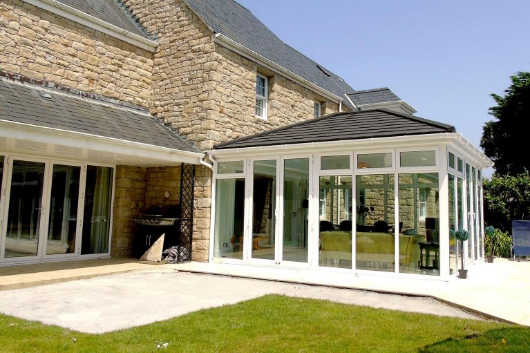 Conservatory installation with tiled roof