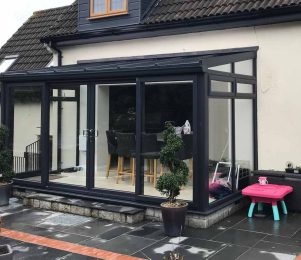 Black lean to conservatory