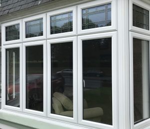 Exterior White UPVC box bay window in East Devon