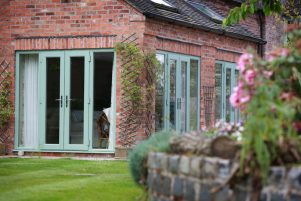 Optima Profile 22 Chartwell Green UPVC french doors back of house